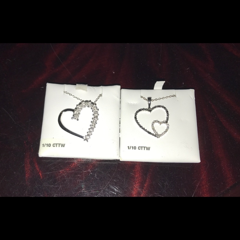 Two sterling silver, diamond heart necklaces